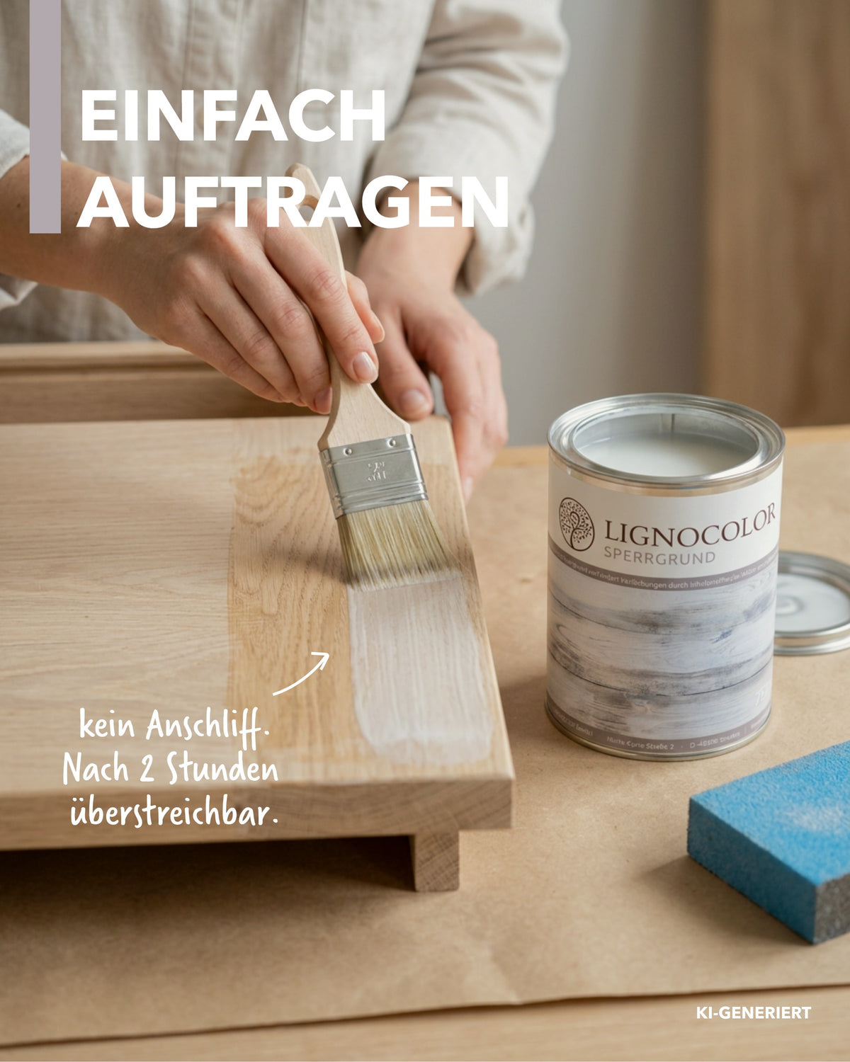 Frauenhand trägt weißen Sperrgrund auf einem Holzbrett auf.